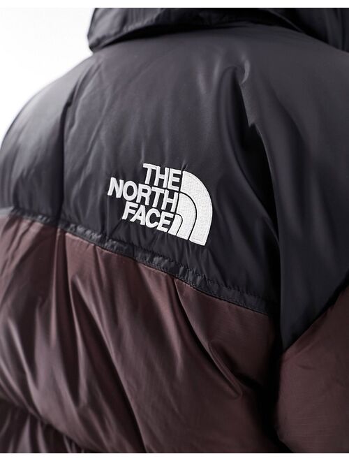 The North Face 1996 Nuptse down puffer jacket in brown and black