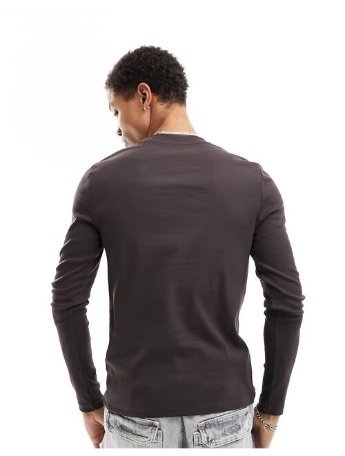 ASOS DESIGN long sleeved muscle fit ribbed T-shirt in dark brown