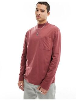 long sleeved turtle neck t-shirt with pocket detail in washed burgundy