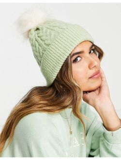 cable knit beanie with faux fur pom in sage