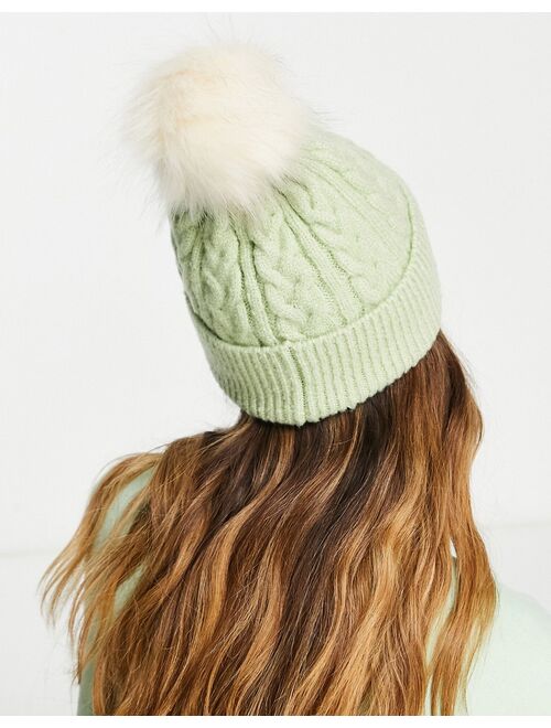 ASOS DESIGN cable knit beanie with faux fur pom in sage