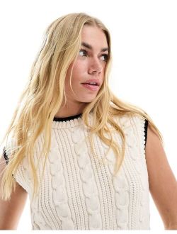 cable knit sleeveless sweater in ecru