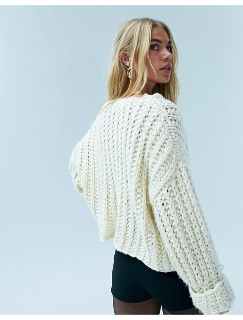 ASOS DESIGN hand knit sweater in chunky stitch with turn back cuffs in cream