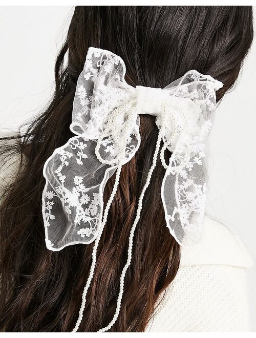 True Decadence oversized mesh bow hair clip in white