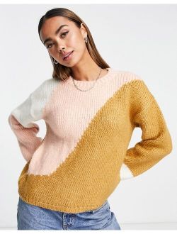 sweater in color block pattern in neutrals