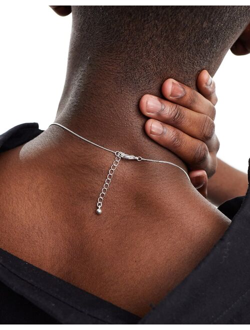 ASOS DESIGN necklace with ditsy cross in silver tone