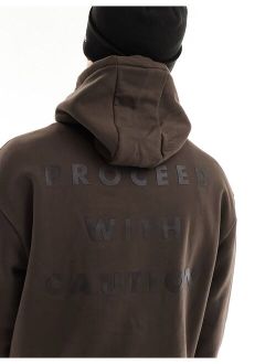 proceed with caution hoodie in brown