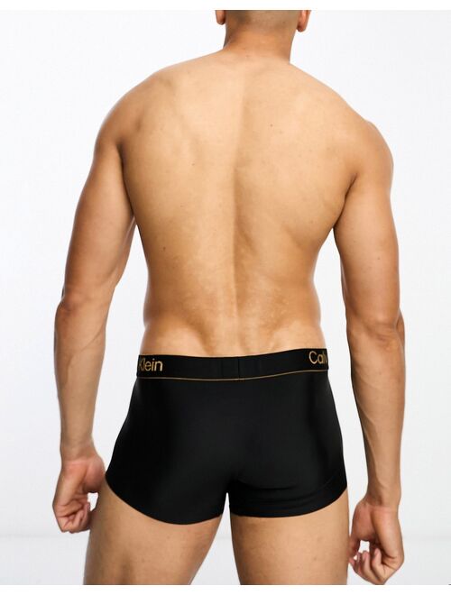 Calvin Klein CK Black low rise trunk in black with gold logo waistband
