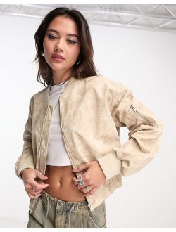 distressed printed bomber jacket in neutral