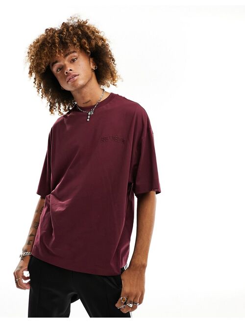 COLLUSION Varsity embroidery skate T-shirt in burgundy