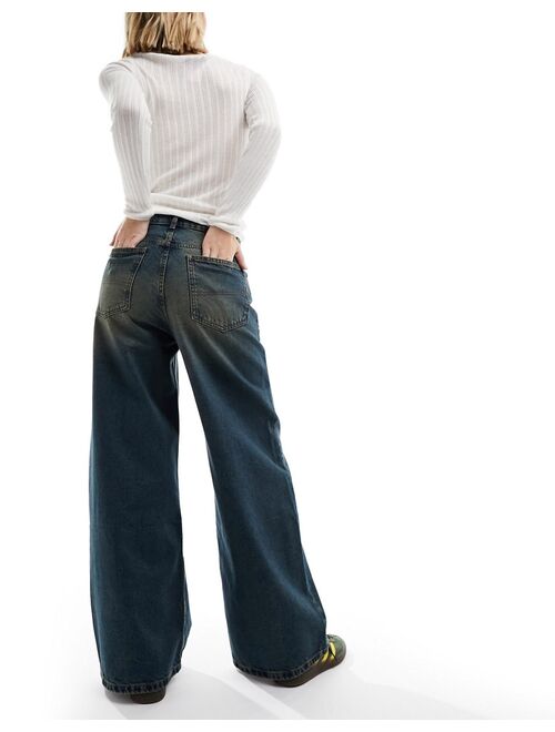 COLLUSION x013 mid rise wide leg jeans in dirty wash