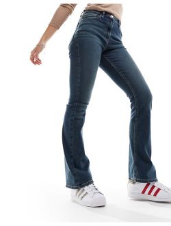 x007 stretch flare jeans in mid-blue wash