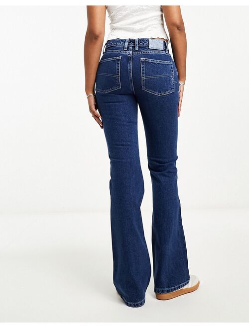 COLLUSION x008 rigid flare jeans with white stitch in blue