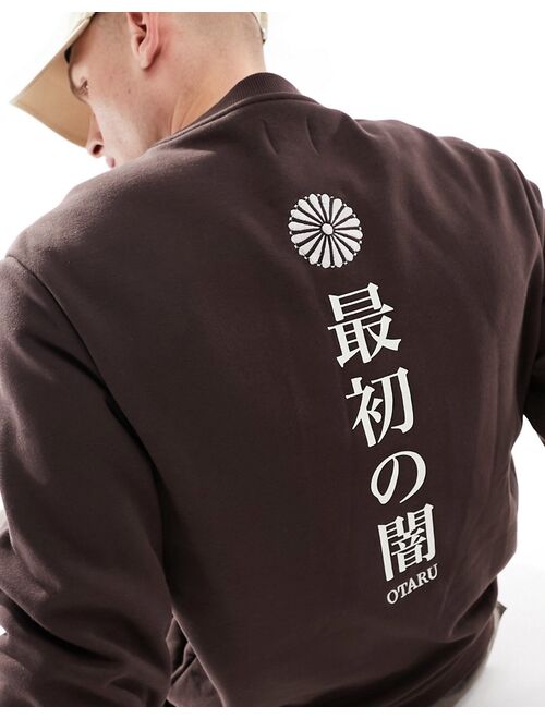 River Island Japanese print crew neck sweatshirt in dark brown
