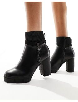 heeled boot with side zip in black