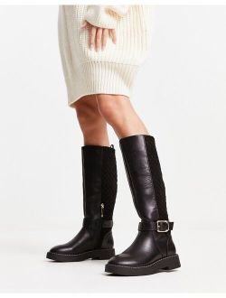 quilted buckle high leg boot in black