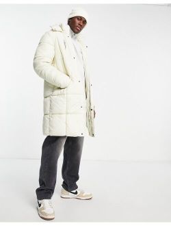 longline puffer coat in ecru