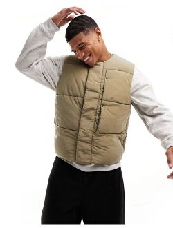 padded vest in light stone