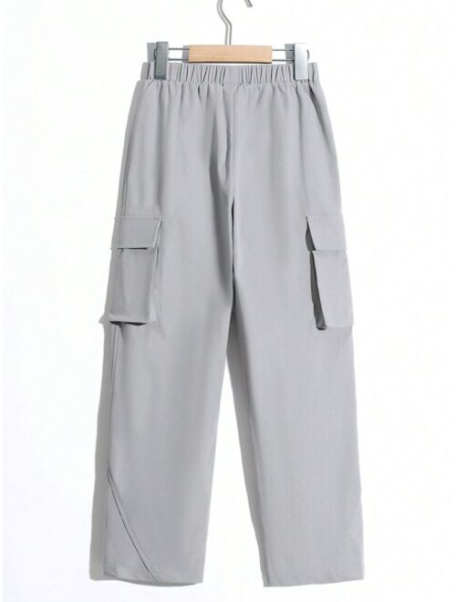 SHEIN Kids EVRYDAY Boys' Casual Straight-Legged Solid Woven Pants With Pleats, Stitched Pockets