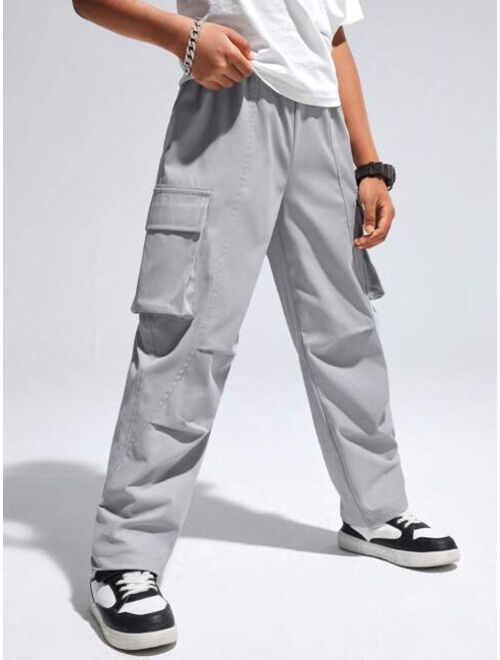 SHEIN Kids EVRYDAY Boys' Casual Straight-Legged Solid Woven Pants With Pleats, Stitched Pockets