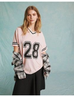 V neck short sleeve graphic oversized football top in pink