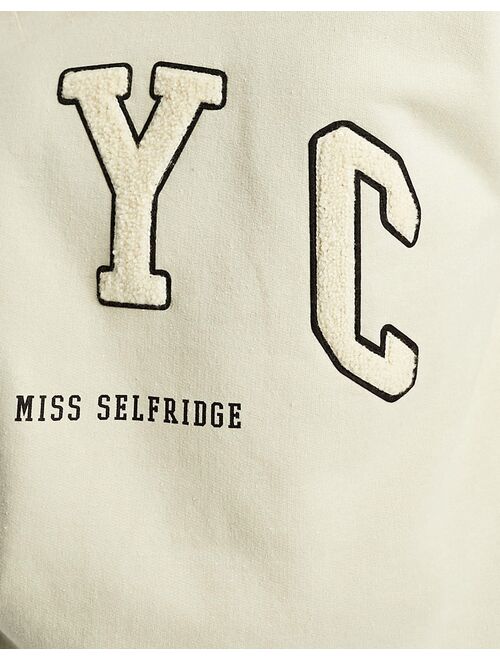 Miss Selfridge NYC terrycloth applique sweatshirt in beige