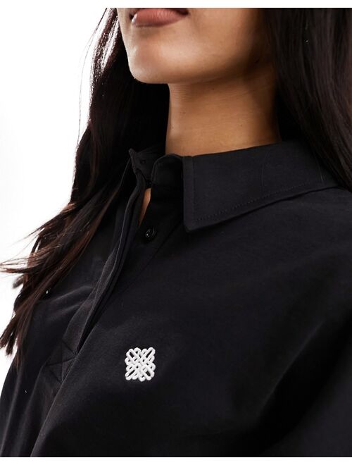 The Couture Club emblem waffle polo top in black