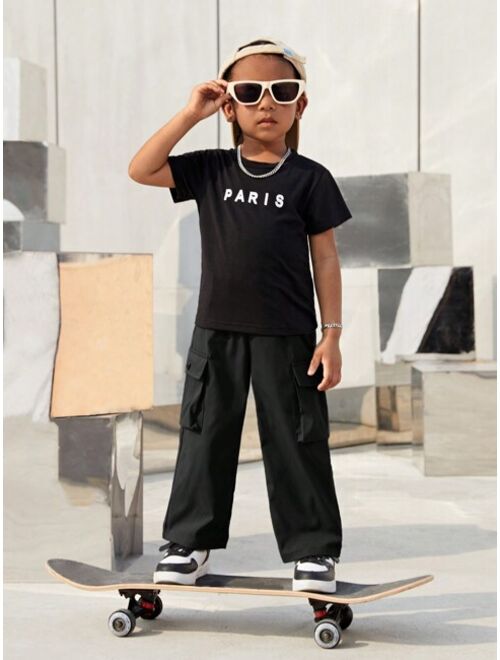 SHEIN Kids SHEIN Solid Black Casual Versatile Flip Cover Pocket Workwear Pants For Young Boys