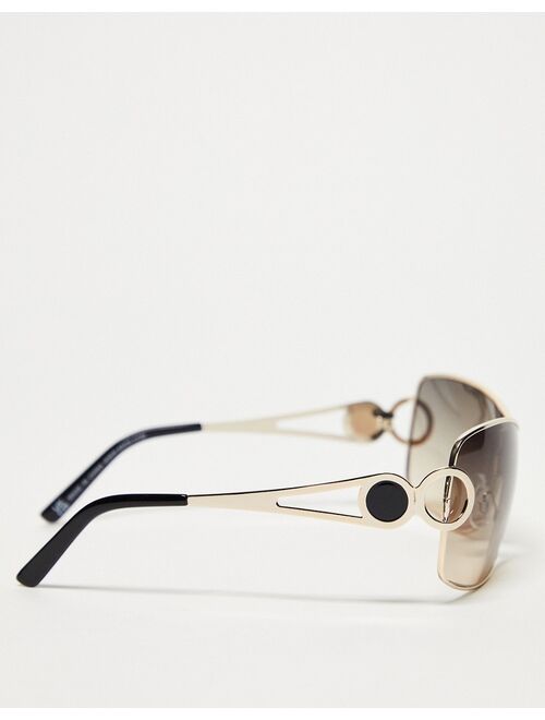 ASOS DESIGN oversized 90s wrap sunglasses with temple detail in gold
