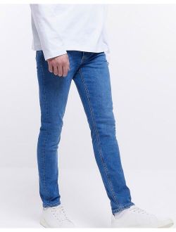 skinny jeans in mid blue