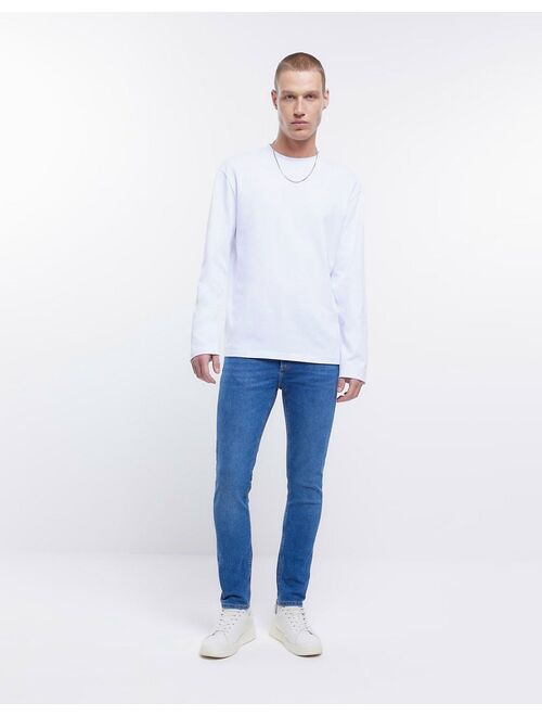 River Island skinny jeans in mid blue